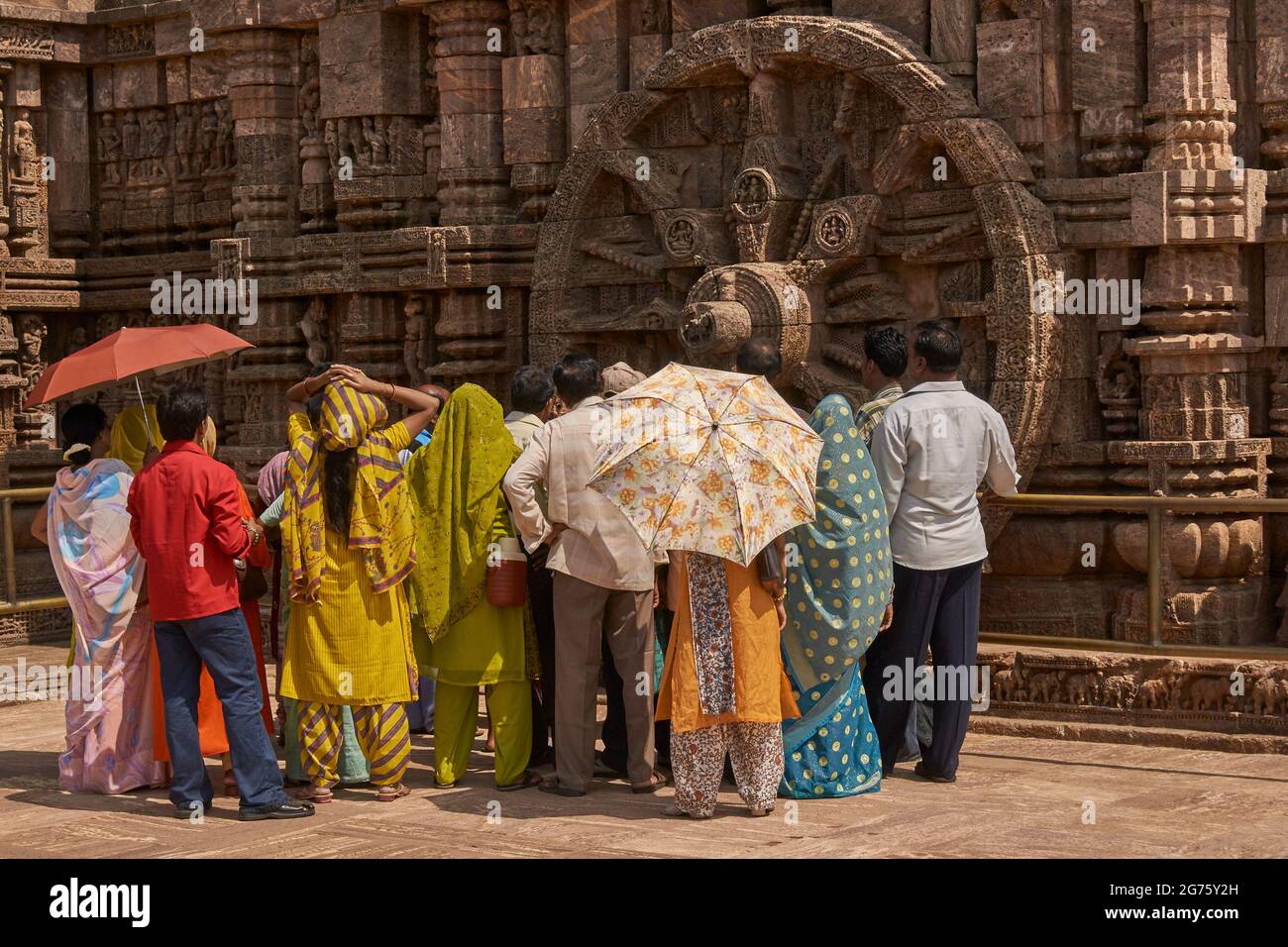 Local tourists at the ancient Surya Hindu Temple at Konark Orissa India. 13th Century AD Stock Photo