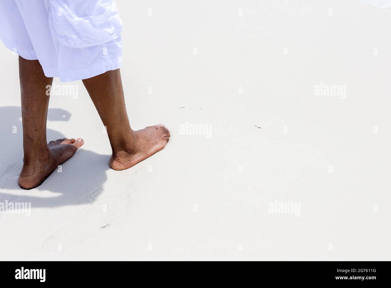 African american man walking hi-res stock photography and images - Alamy