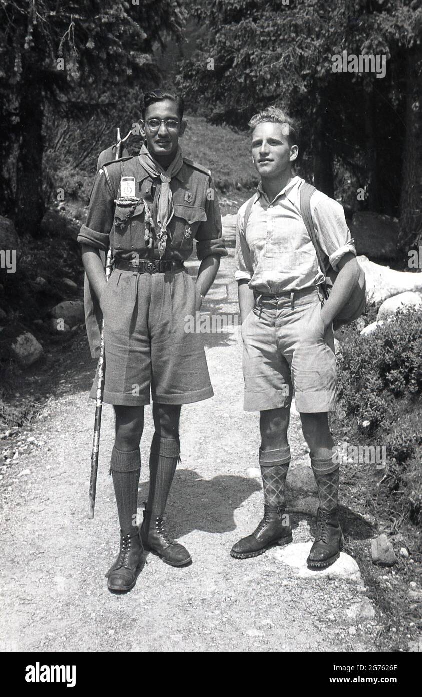 1935, historical, a young male walker standing with another young man, a Czech scout, in the lowlands of the Sudetes or Sudeten mountains in the Sudetenland, Czechoslovakia. Czech Scouting (Junak) was founded by Antonín Benjamin Svojsík in 1911 when the Czech population were part of the German and the Austo-Hungarian Empire. After 1918 and the Treaty of Versailles with the creation of Czechoslovakia, scouting became the country's most popular youth organization. Stock Photo