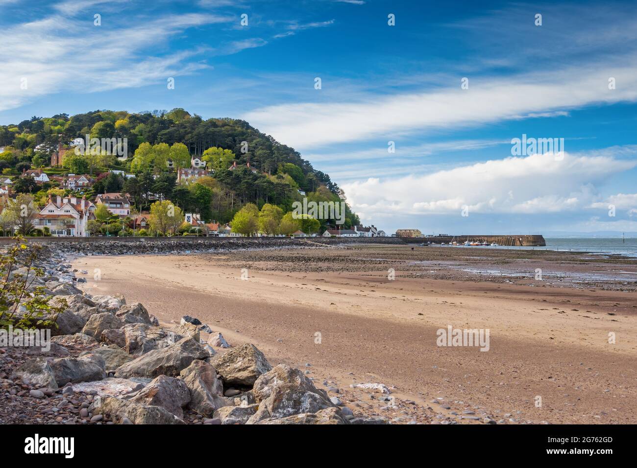 The seafront and beach at Minehead in Somerset, looking towards the harbour. Stock Photo