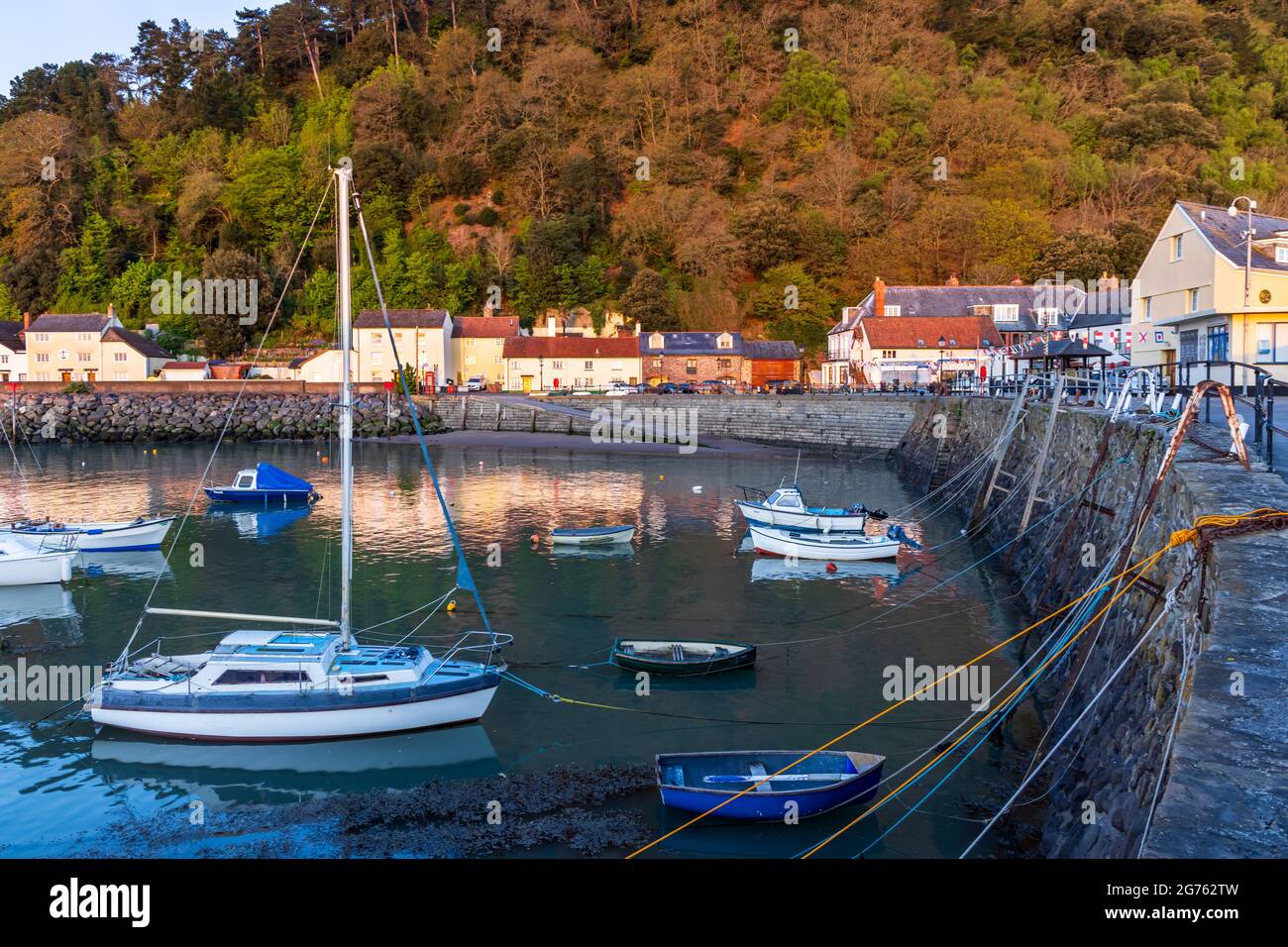 Golden morning light at the old harbour at Minehead on the Somerset coast. Stock Photo