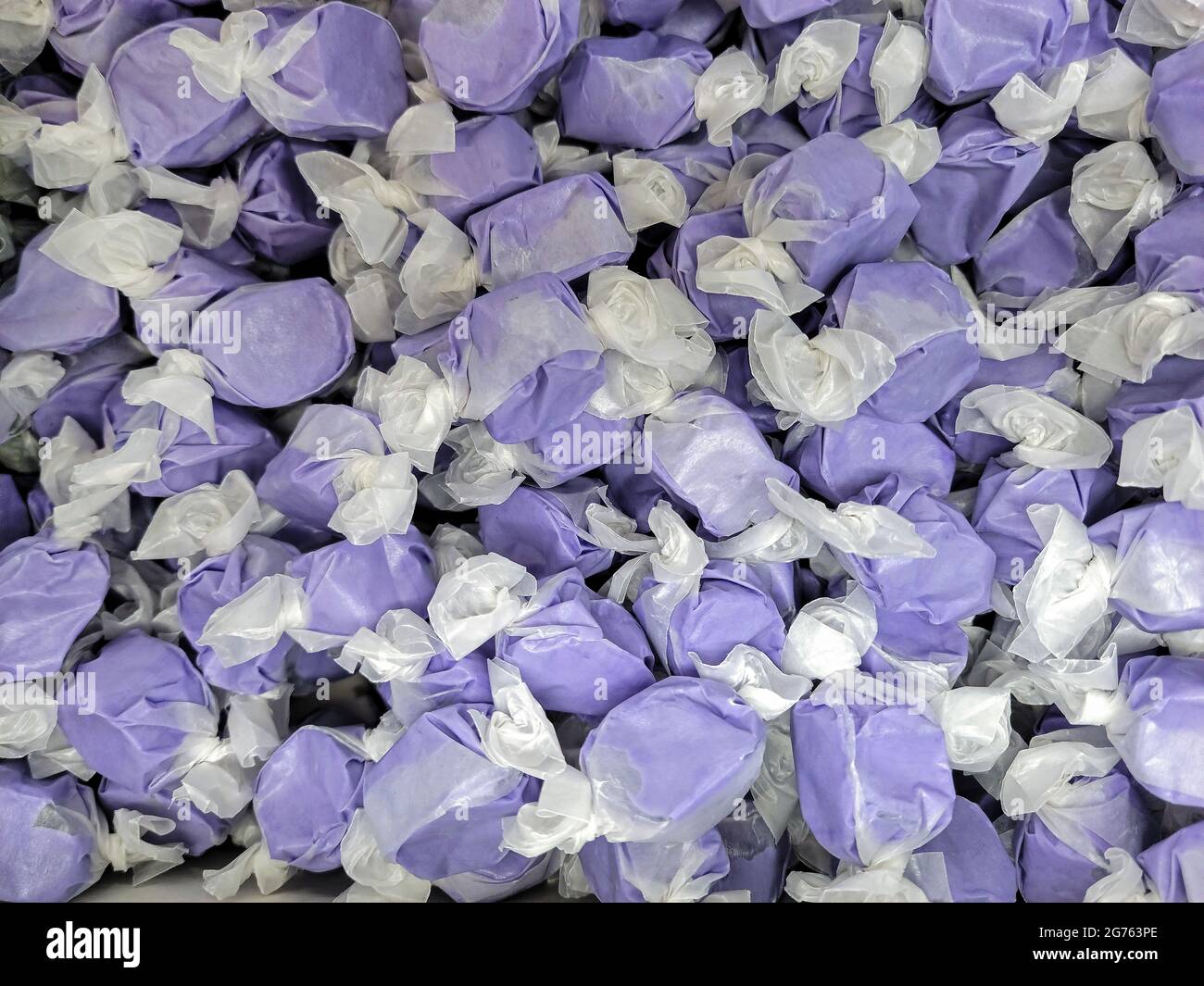 Collection of purple and white huckleberry flavored wrapped salt water