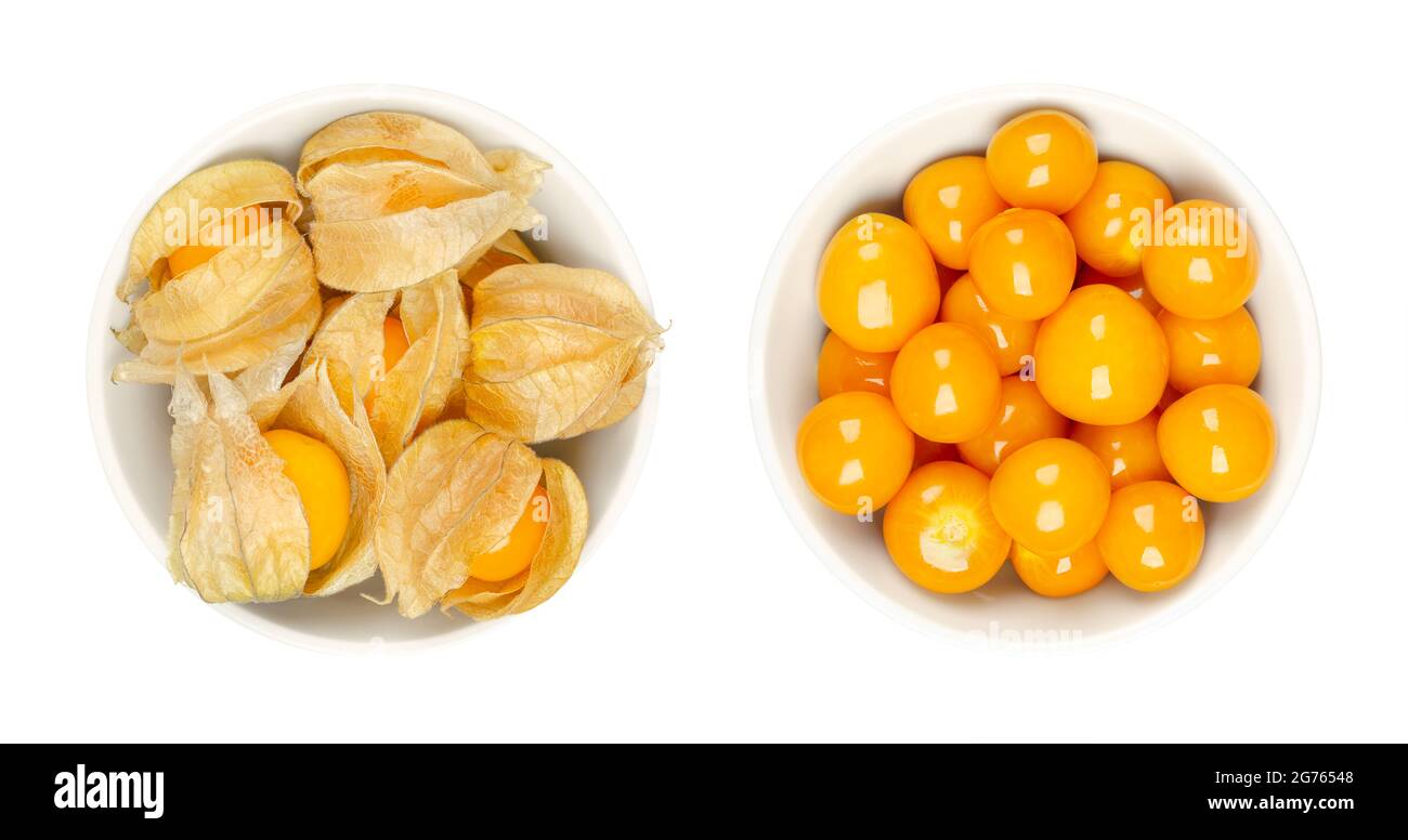 Cape gooseberries, with and without calyx, in white bowls. Fresh fruits of Physalis peruviana, also golden, inca and ground berry, uchuva and poha. Stock Photo