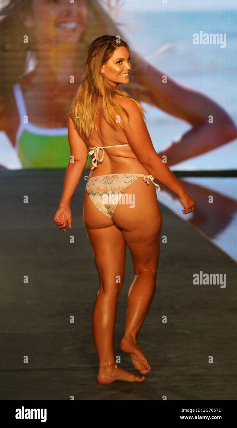 MIAMI, FLORIDA - JULY 10: Chelsea Heath walks the runway during the
