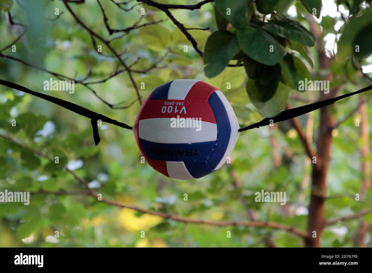 Suspended volleyball ball used by volleyball players in training. Ball