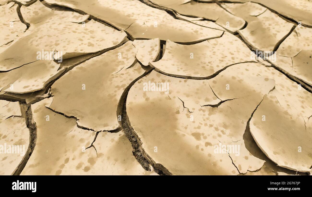 Cracked and dry clay soil due to lack of rain, Rio Po, Italy Stock Photo