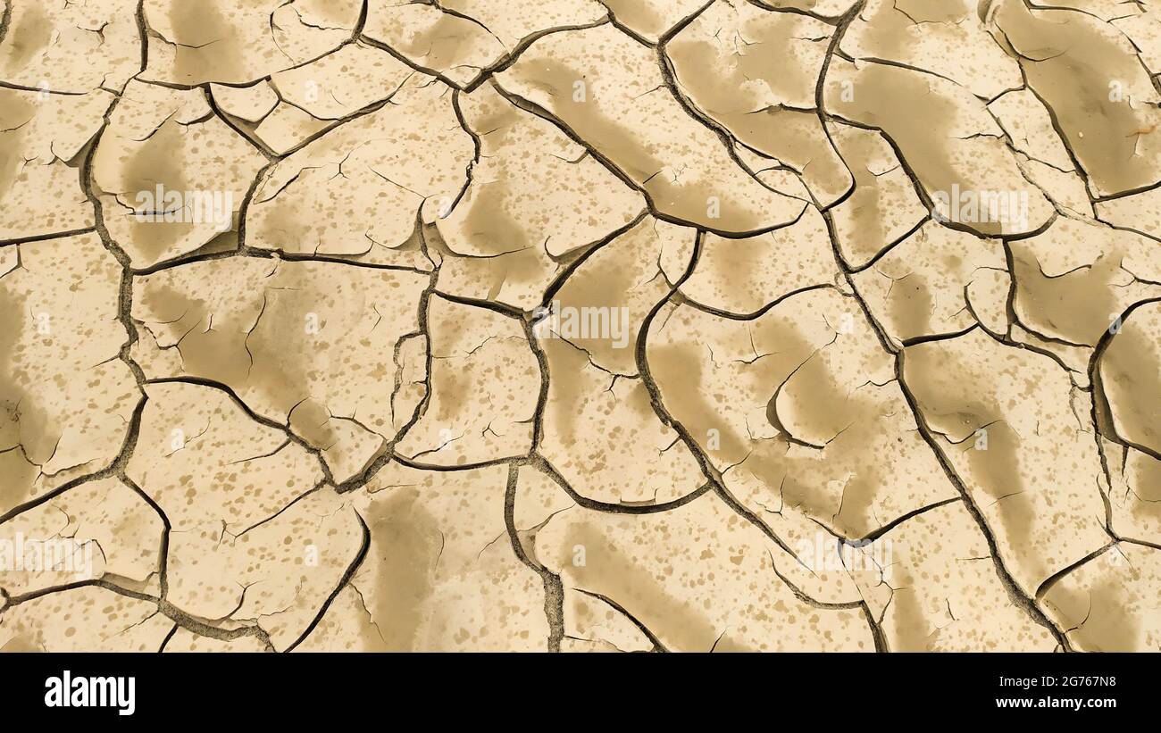 Cracked and dry clay soil due to lack of rain, Rio Po, Italy Stock Photo