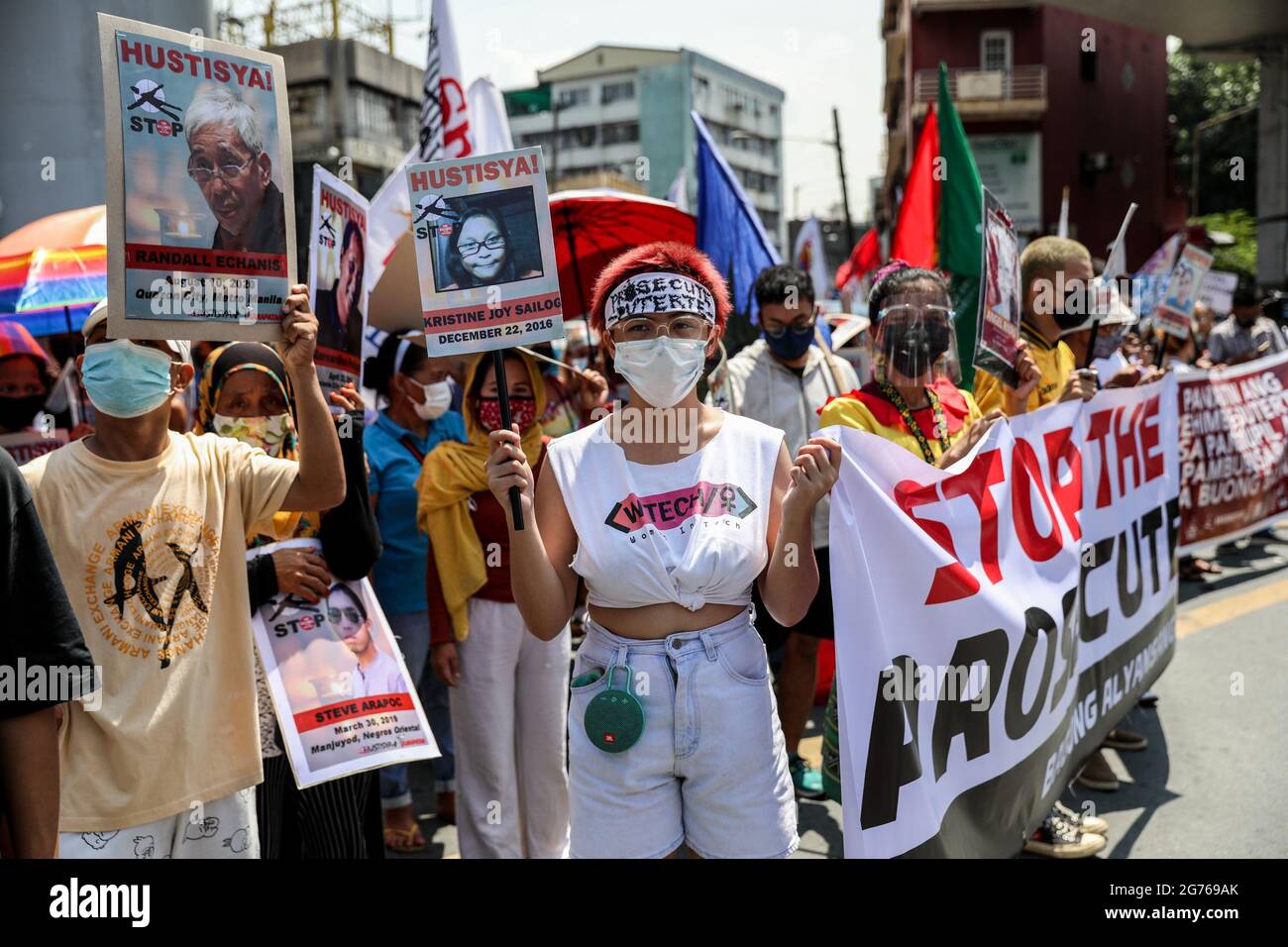 Activists carry signs as various groups protest marking the fifth and final year in office of President Rodrigo Rodrigo Duterte near the Malacanang Palace in Manila. The groups condemned the Duterte administration for its alleged human rights violation for the thousands who have been killed under the government’s war on illegal drugs and criminality including the death of activists and critics. Philippines. Stock Photo