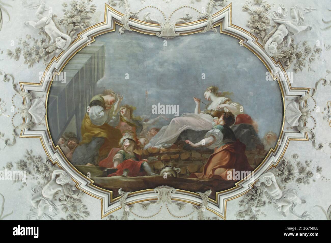 Ceiling painting 'Death of Dido' by Czech and Austrian Baroque painter Michael Václav Halbax (1661- 1711) in Sternberg Palace (Šternberský palác) in Prague, Czech Republic. Suicide of the mythical foundress of Carthage who burnt herself to death after King Iarbas of Numidia tried to force her to marry him is depicted. Sternberg Palace serves now as the permanent exhibition of old masters of the National Gallery (Národní galerie). Stock Photo