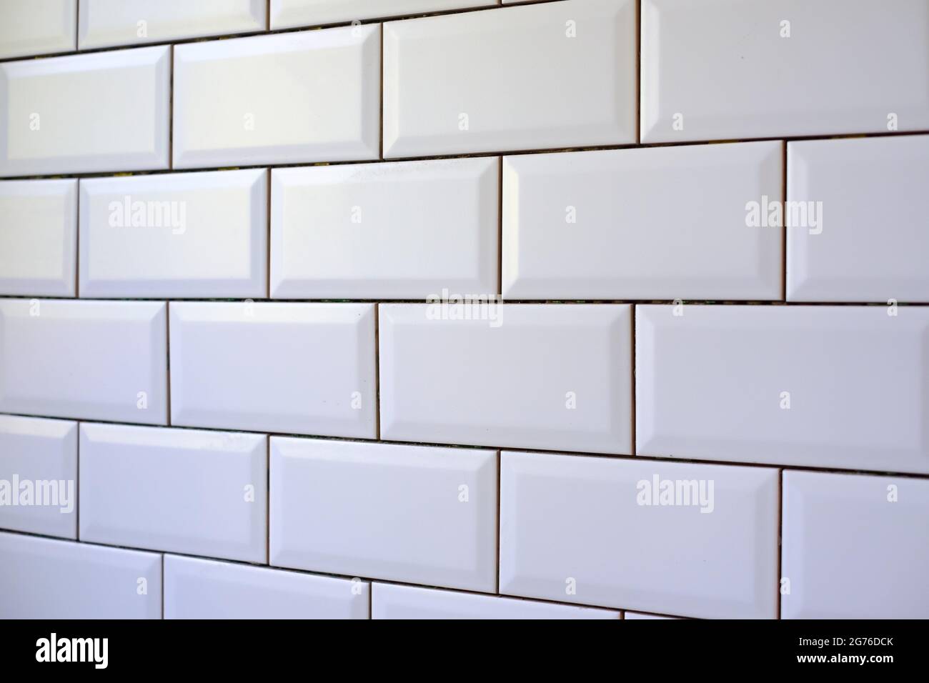 New white tiles without grouting at kitchen wall Stock Photo Alamy