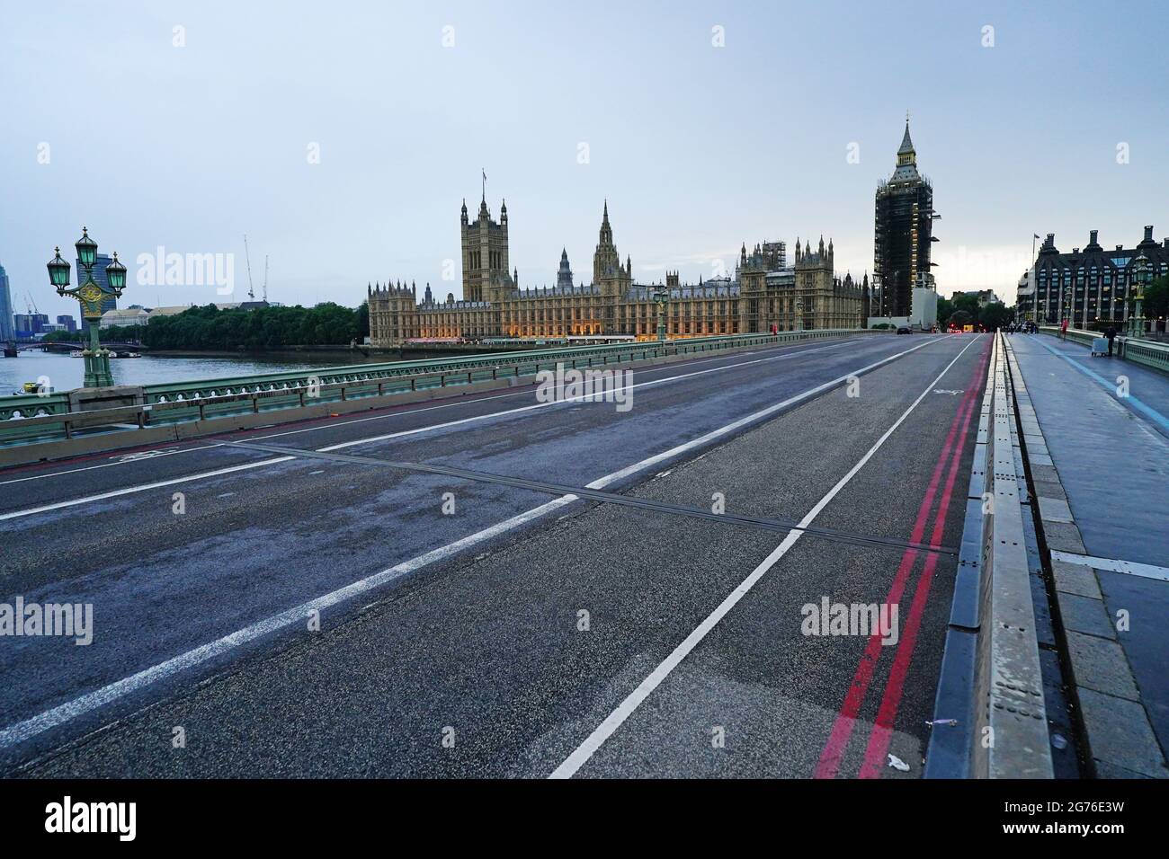 Westminster Bridge, which crosses the Thames in central London, is empty of traffic during the UEFA Euro 2020 Final between Italy and England. Picture date: Sunday July 11, 2021. Stock Photo