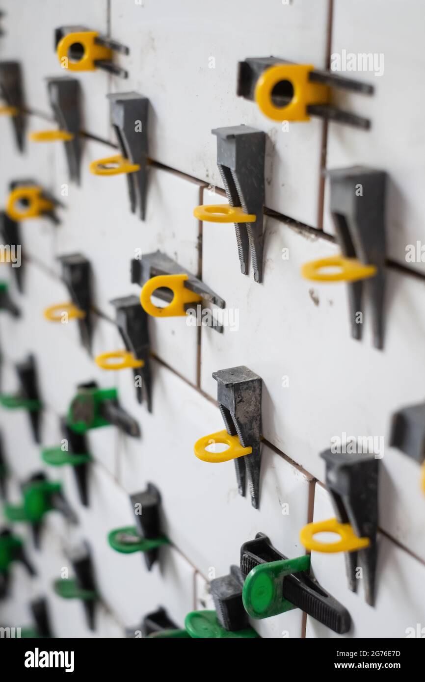 View on tile leveling system with plastic clips and wedges Stock Photo