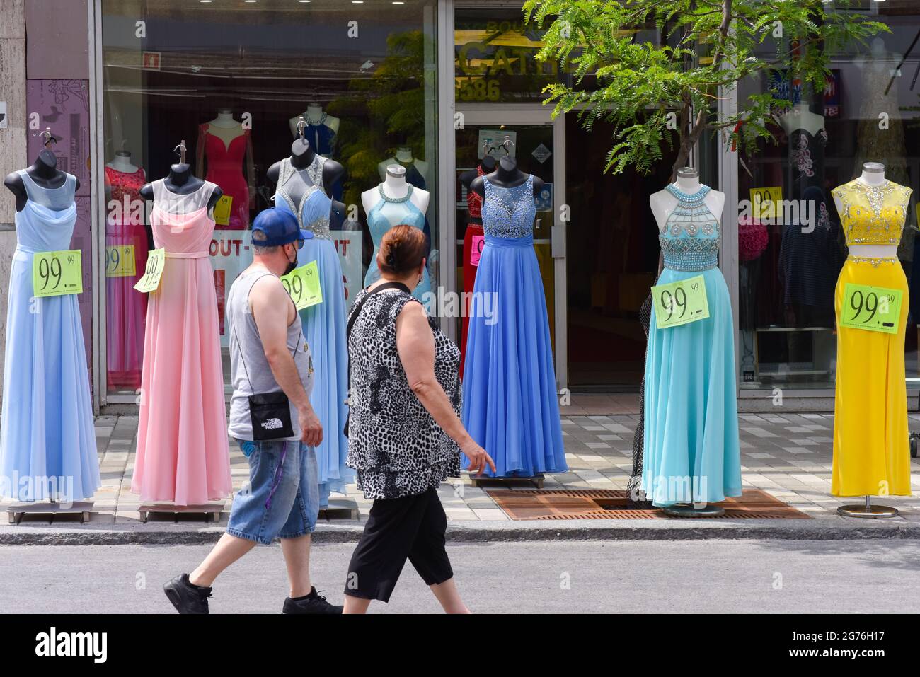 Caption 69/150 Shoppers , Sidewalk sale