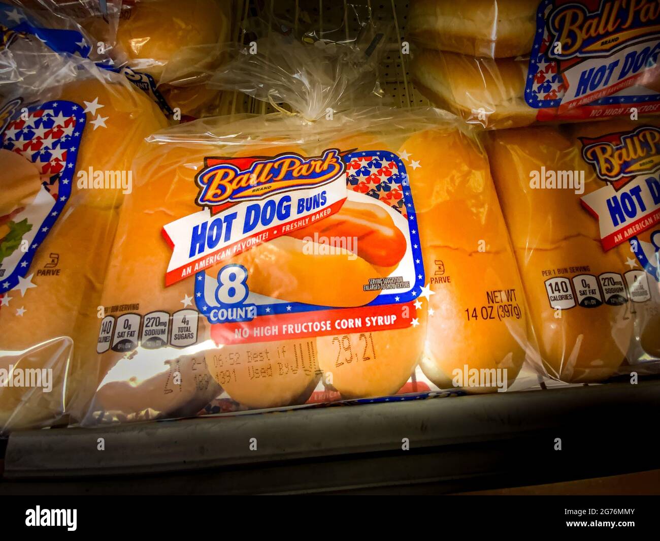 Shiloh, IL--July 10, 2021; a package of eight hotdog buns branded Ball Park and made by Bimbo Bakeries North America sits on a grocery store shelf wit Stock Photo