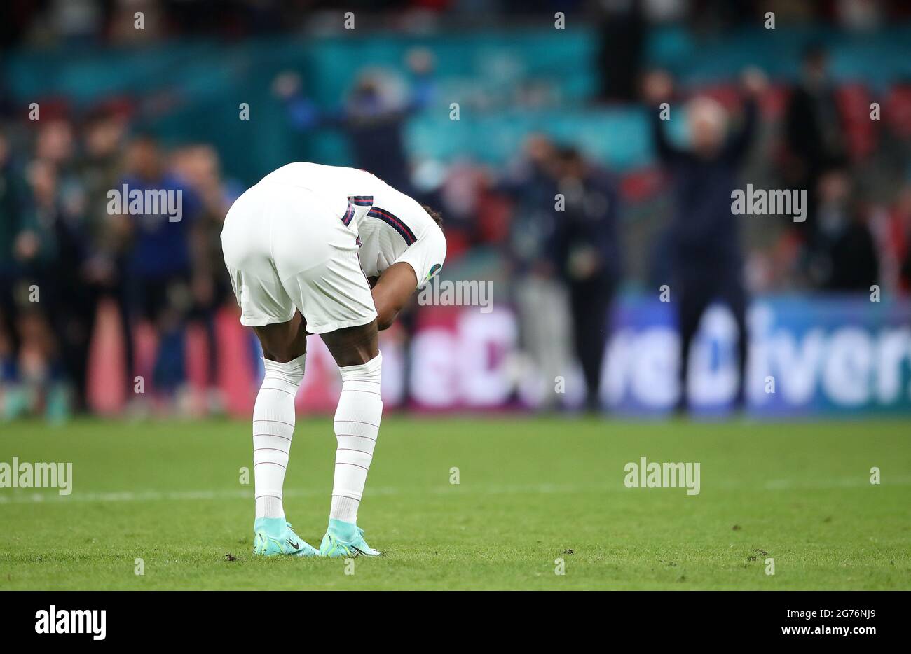 England's Marcus Rashford reacts after missing in the penalty shoot-out during the UEFA Euro 2020 Final at Wembley Stadium, London. Picture date: Sunday July 11, 2021. Stock Photo