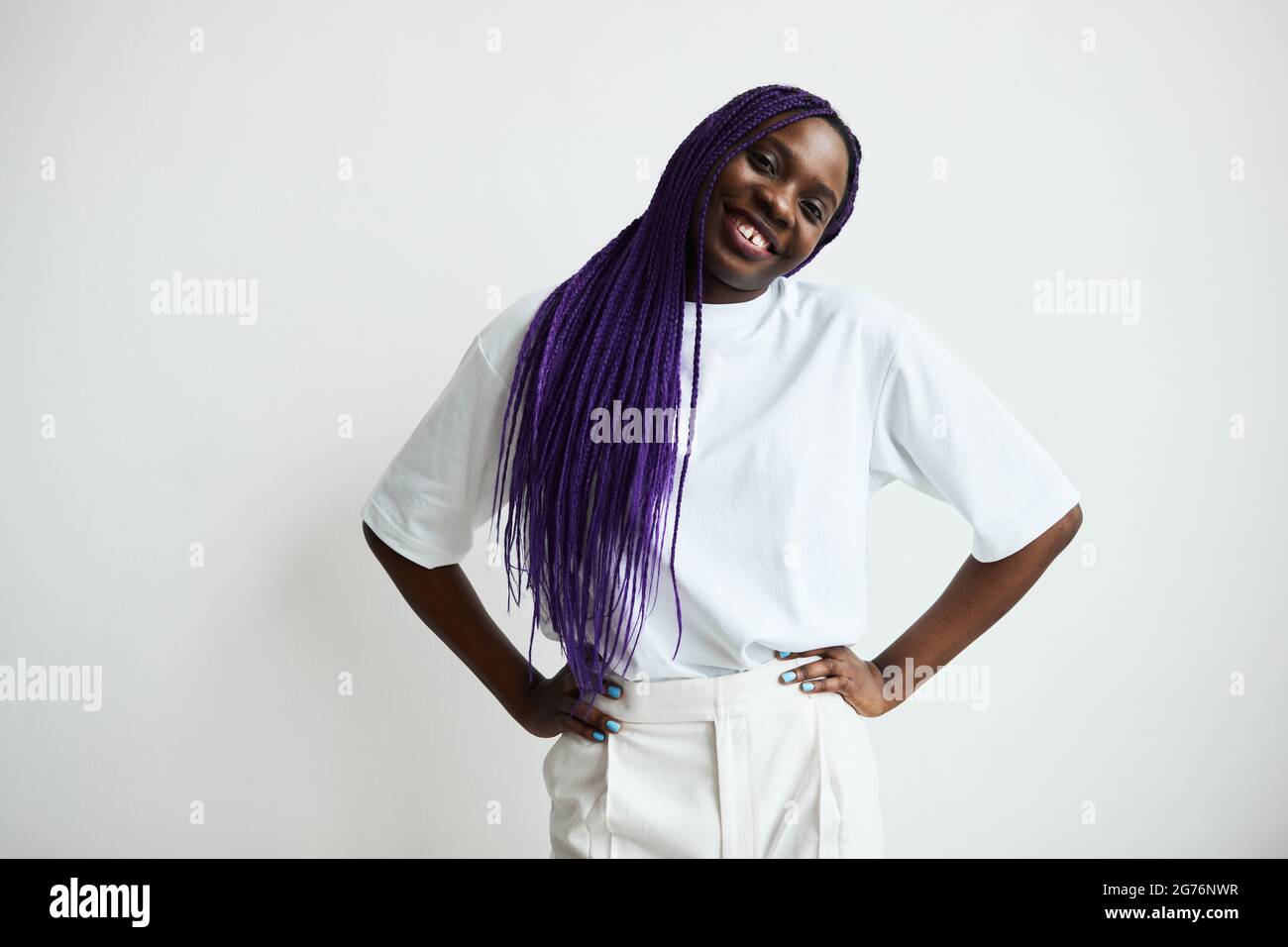 Minimal waist up portrait of contemporary African-American woman with ...