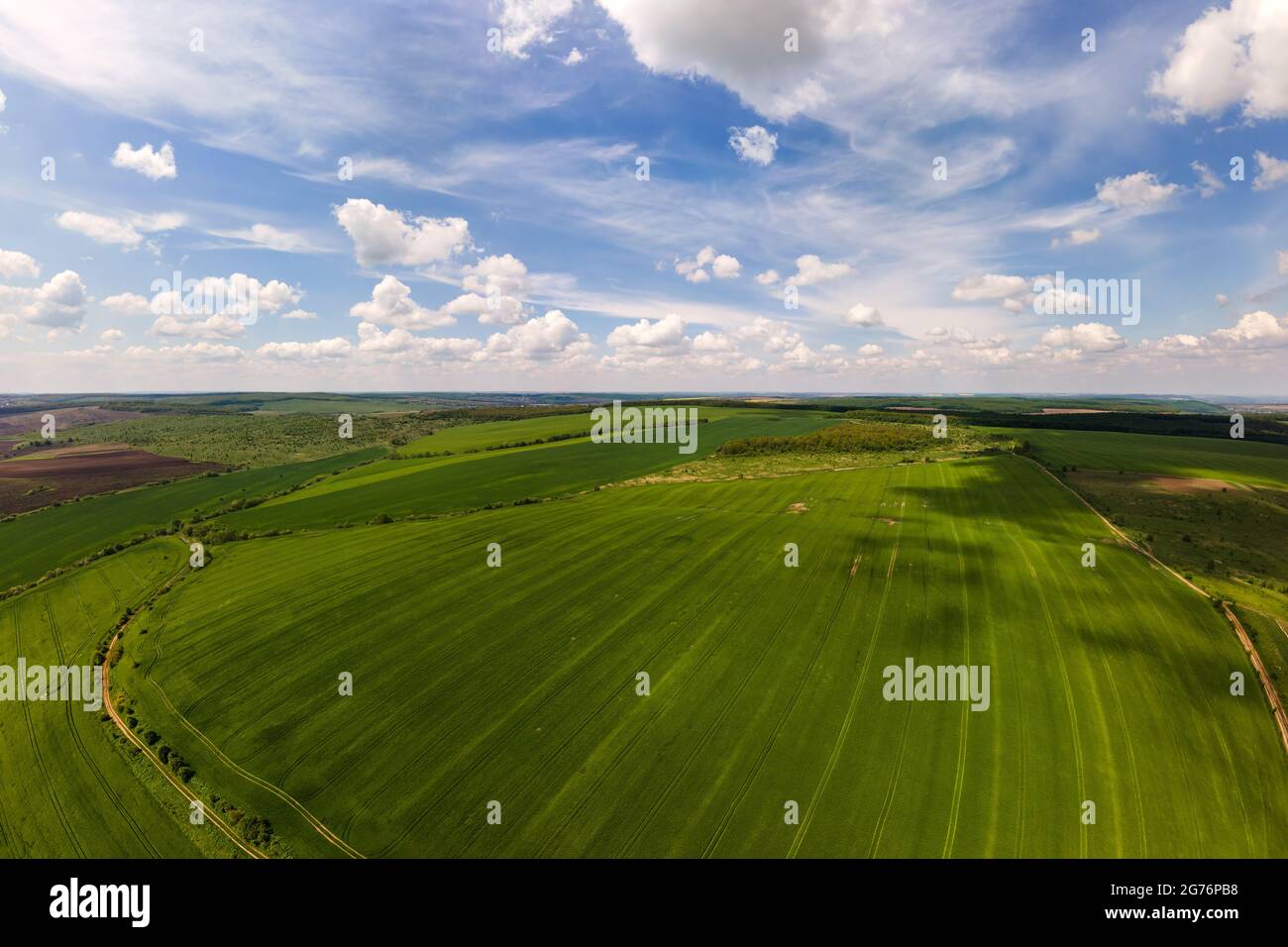 Aerial landscape view of green cultivated agricultural fields with ...