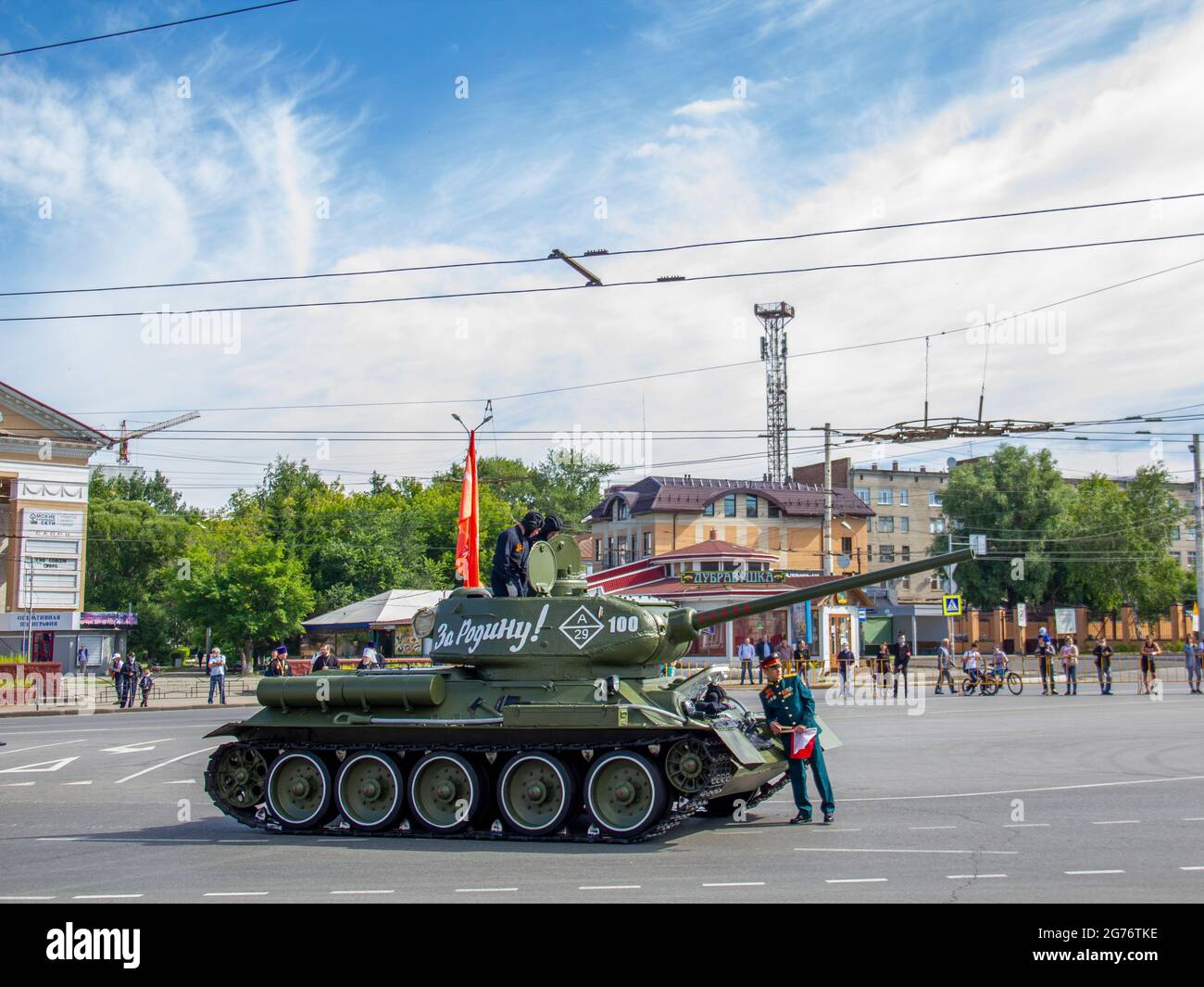 Omsk, Russia. 24 June, 2020. The crew of the T-34 tank of the Great Patriotic War expects the beginning of the parade. Parade of military equipment in Stock Photo