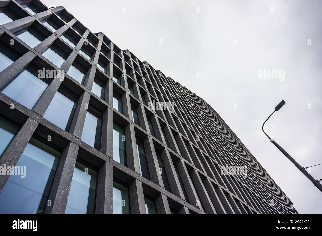 POZNAN, POLAND - Nov 16, 2018: A closeup of the modern Baltyk office building with many windows located on the Roosevelta street Stock Photo