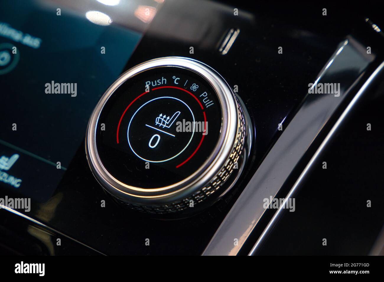 A car's black interior seat heat controls Stock Photo Alamy