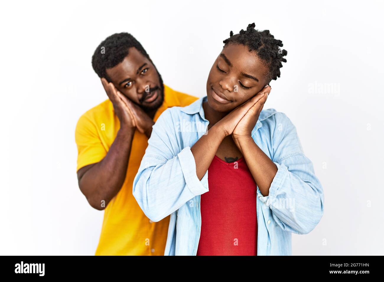 Young african american couple wearing casual clothes sleeping tired ...