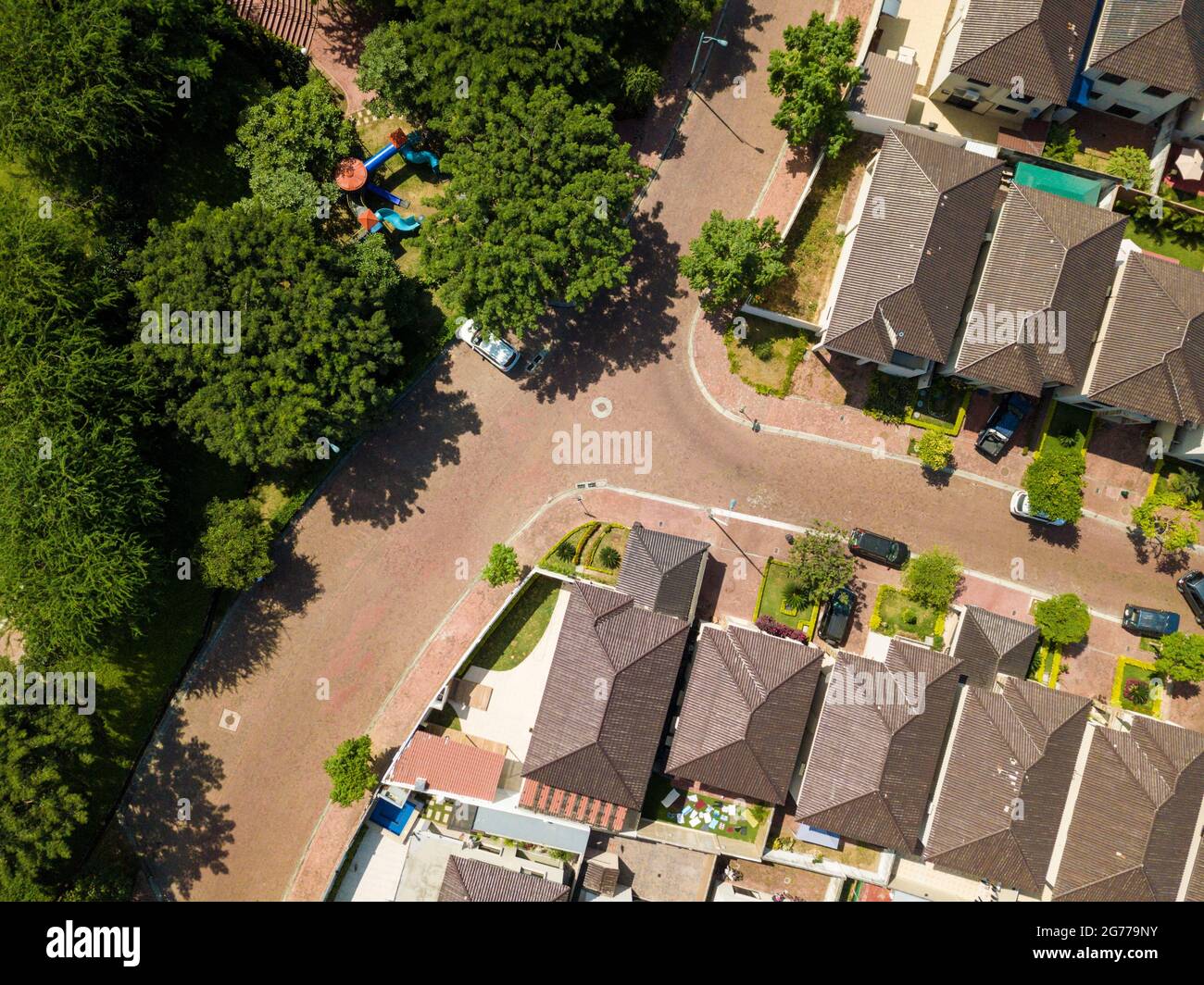 Image showcasing An aerial view of houses of a gated community un Guayaquil, Ecuador ...