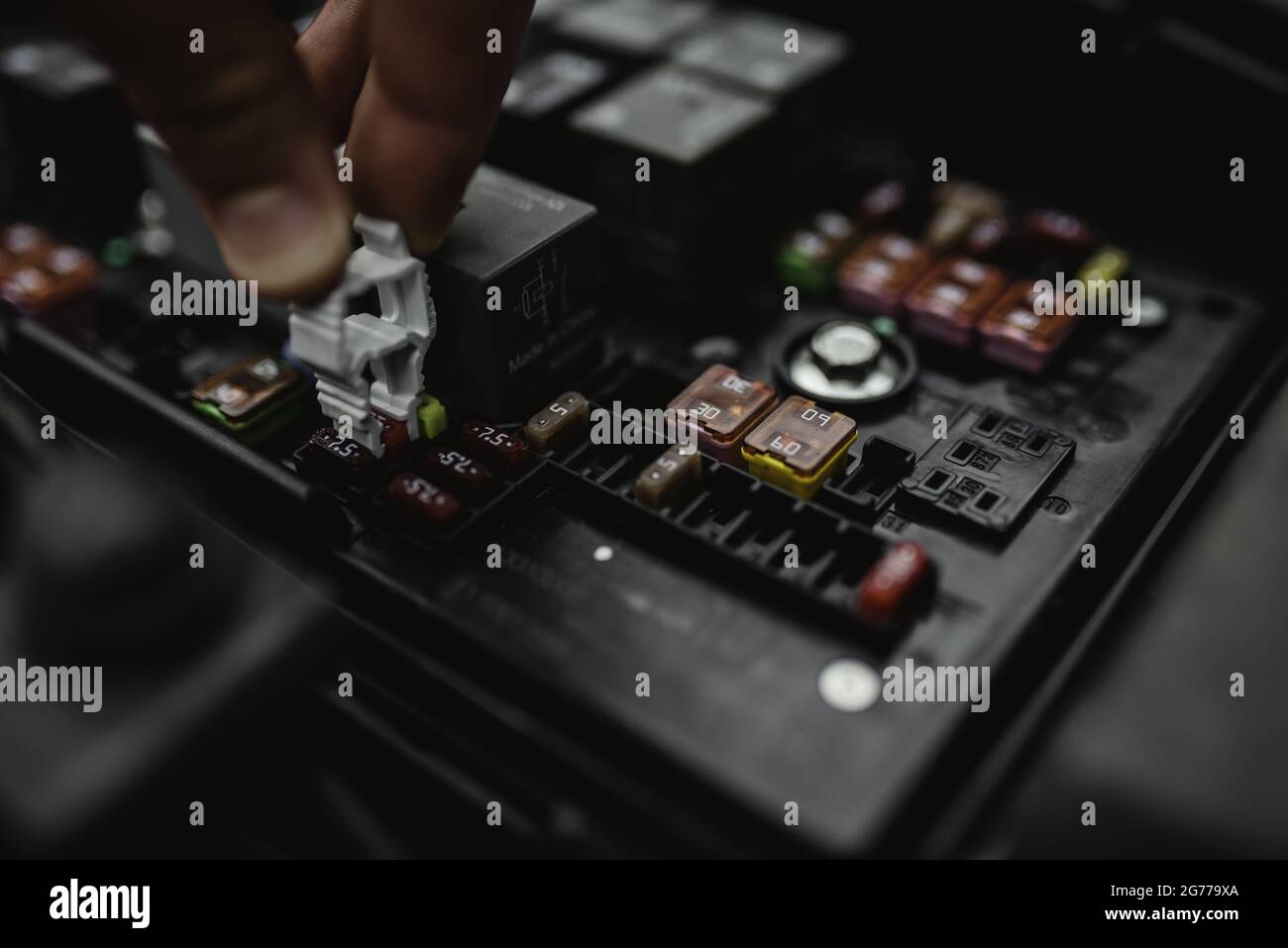 the photo of car fuse change Stock Photo Alamy