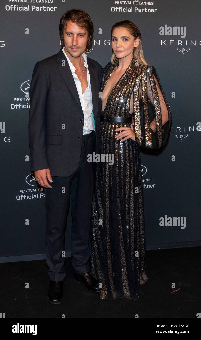 Maxime Roy and Clotilde Courau attend the 'Kering Women In Motion