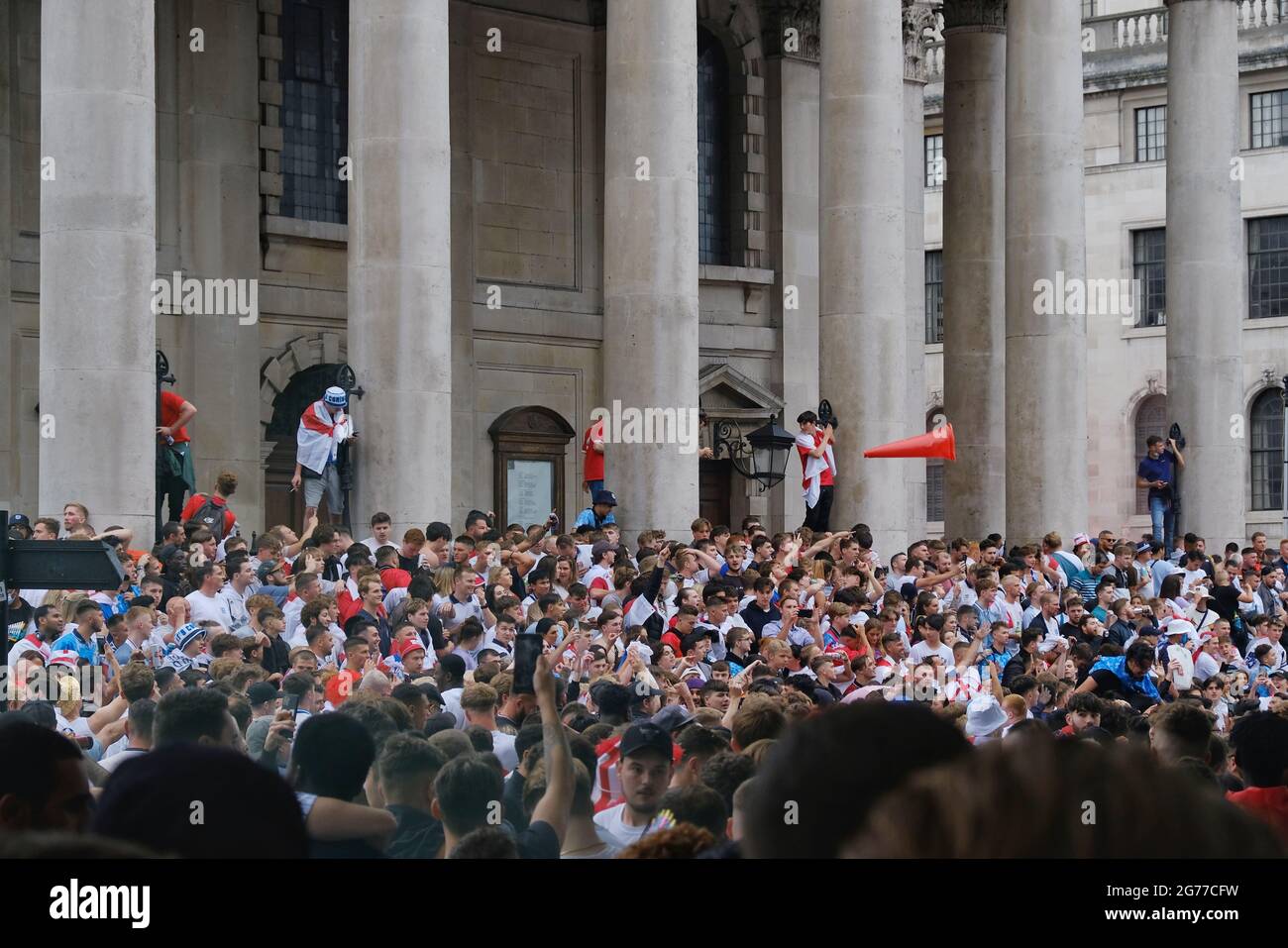 Hundreds of England football fans gathered close to Trafalgar Square ahead of the Euro 2020 final. Stock Photo