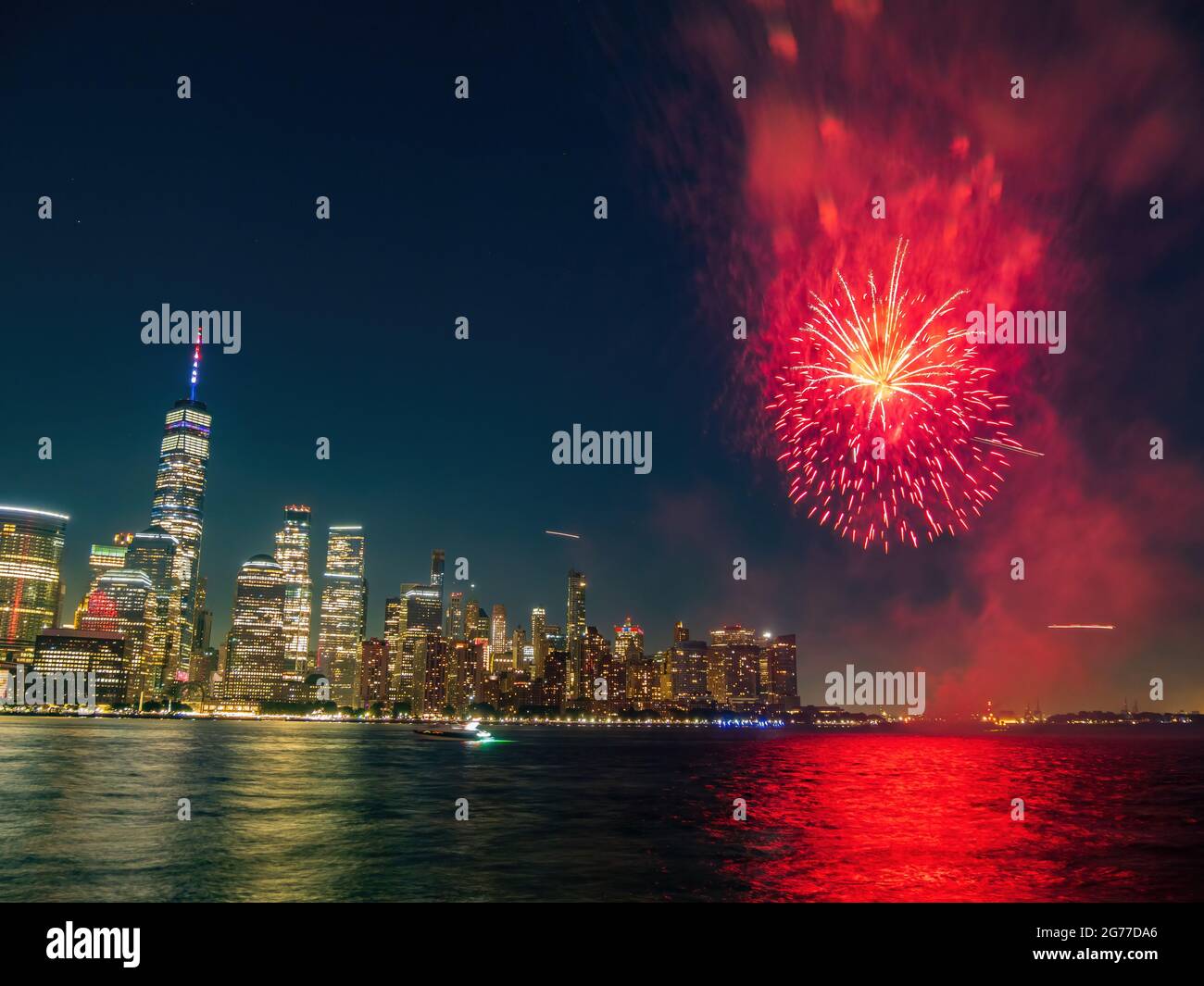 Fireworks celebration of July 4th with the famous Manhattan skyline at