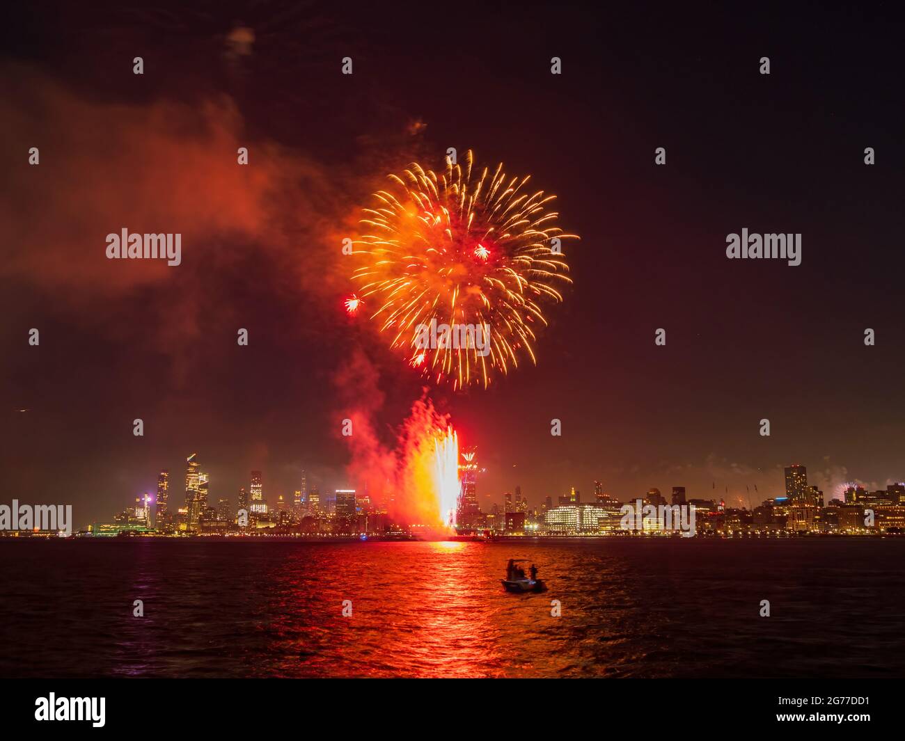 Fireworks celebration of July 4th with the famous Manhattan skyline at