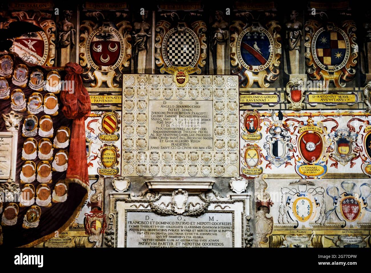 Coats of Arms of former students on the wall of Bologna University in Italy Stock Photo