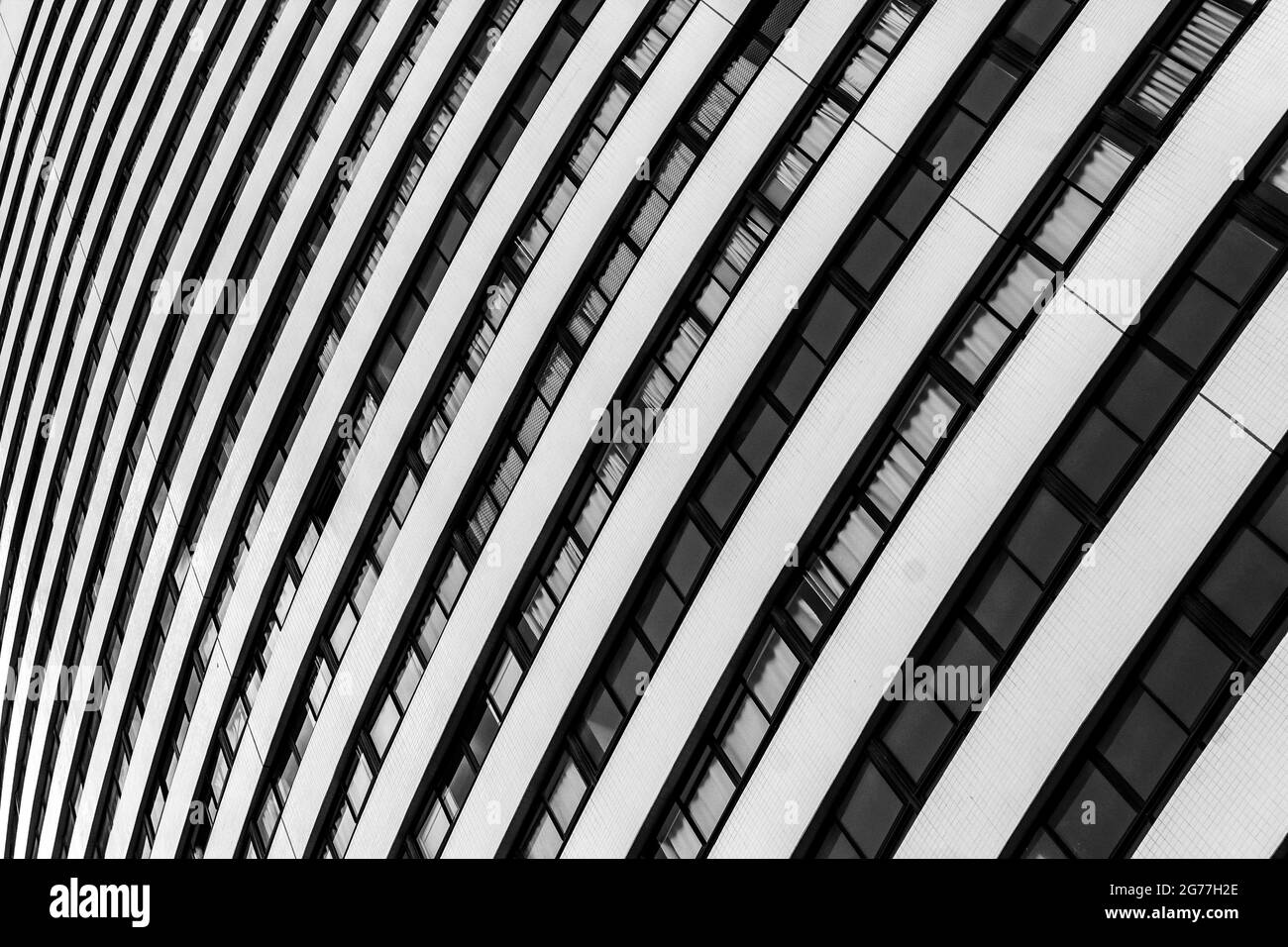 Grayscale shot of a modern apartment building Stock Photo