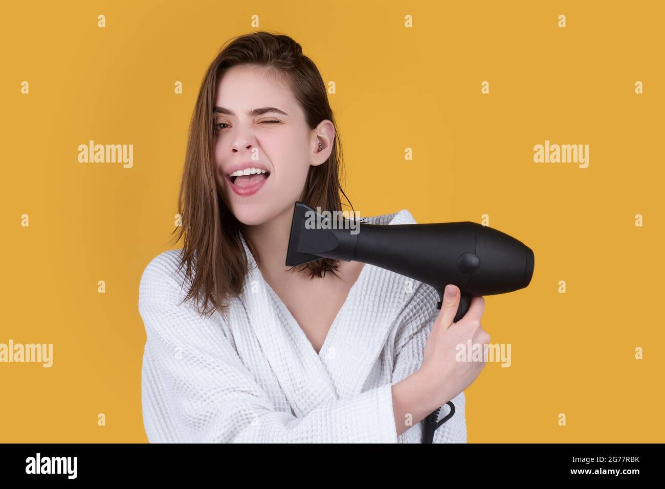 Girl Blow Drying Hair High Resolution Stock Photography and Images - Alamy