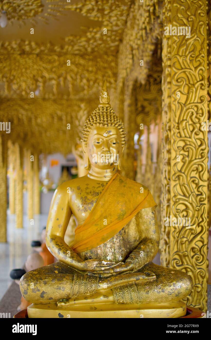 golden Buddha Statue in a Thai Temple Stock Photo - Alamy