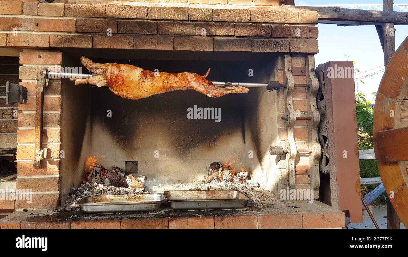 Spit Roasted Lambs, traditional way of roasting lambs on a rotisserie