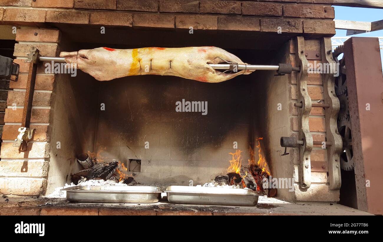 Spit Roasted Lambs, traditional way of roasting lambs on a rotisserie