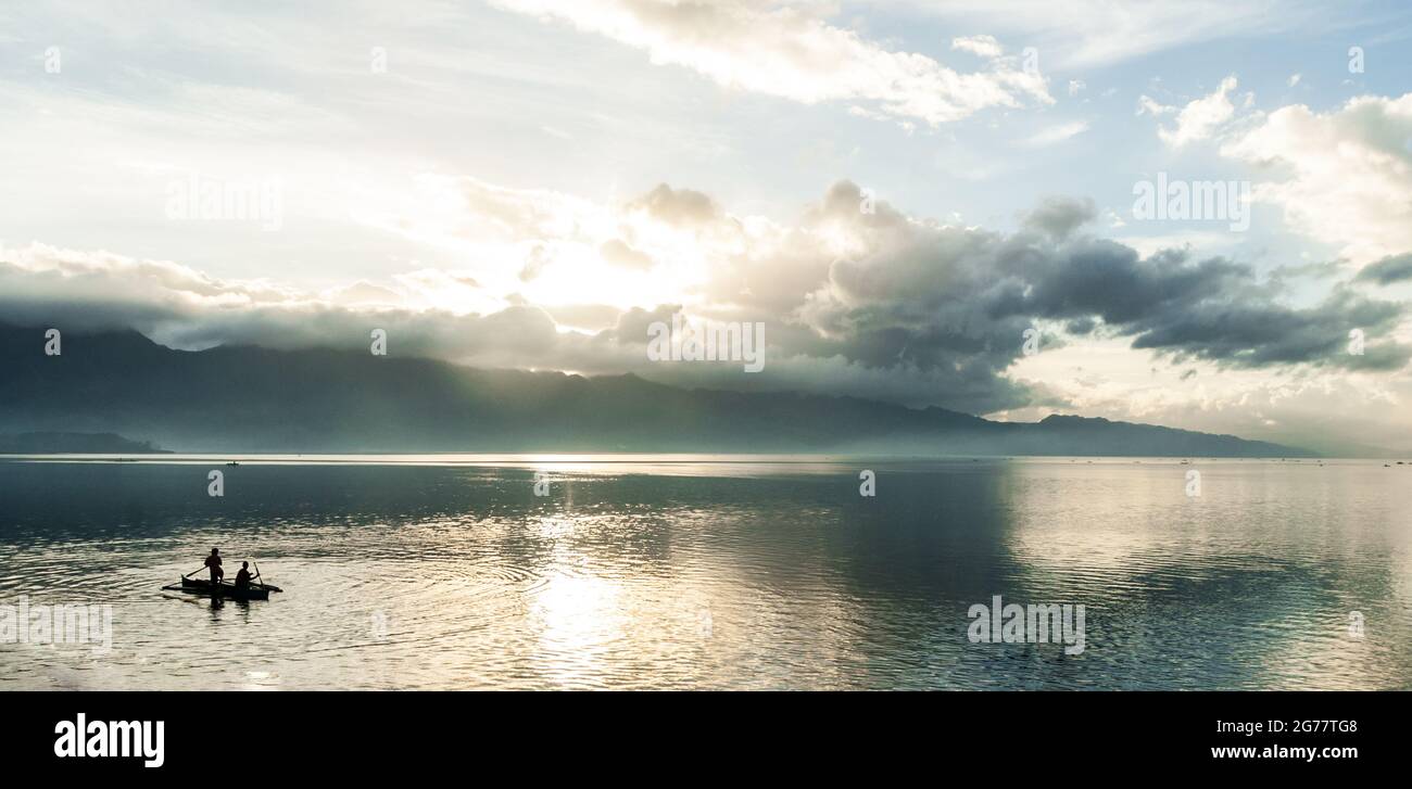 silhouette of fishermen on a boat Stock Photo - Alamy