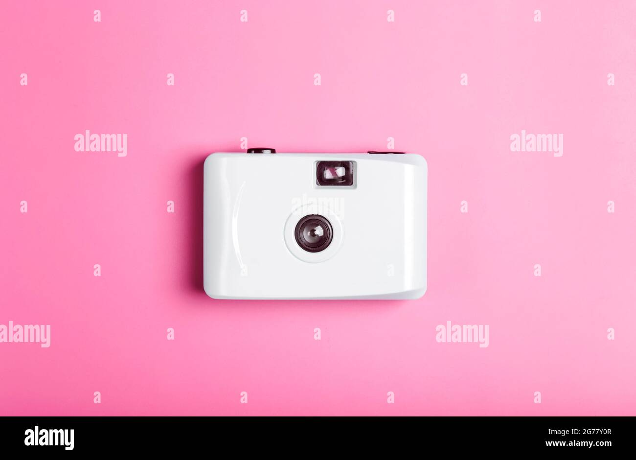 Film camera on a color minimal background. Photography, lifestyle concept. High quality photo Stock Photo