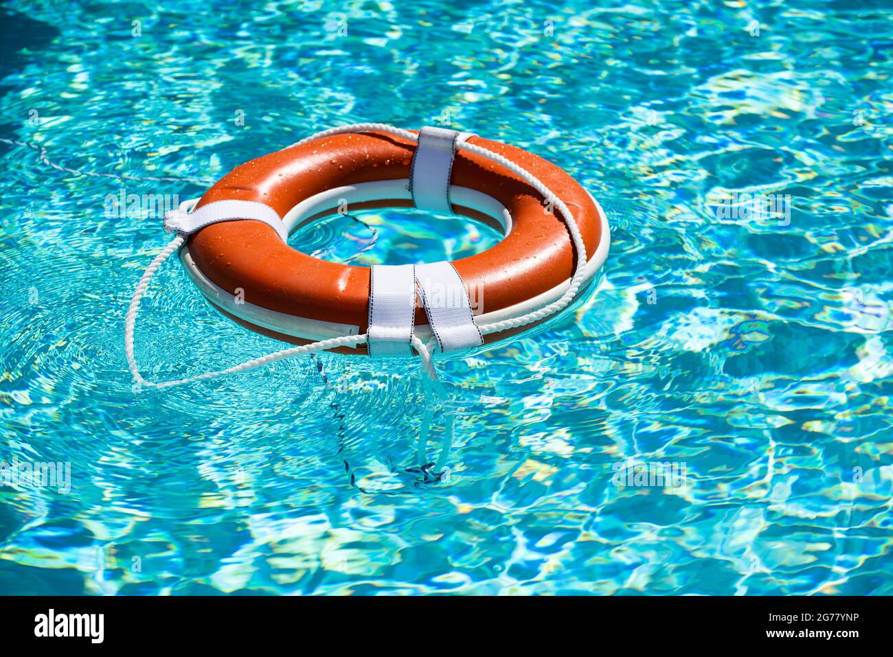 The concept of help, rescue, drowning, storm. Thrown life buoy saving  drowning person. Life buoy. Lifebuoy in water. Life ring floating in a sea,  life Stock Photo - Alamy