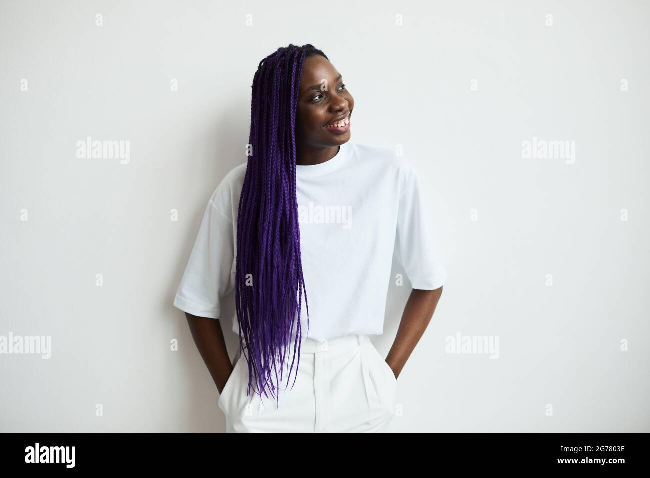Minimal waist up portrait of carefree African-American woman with ...