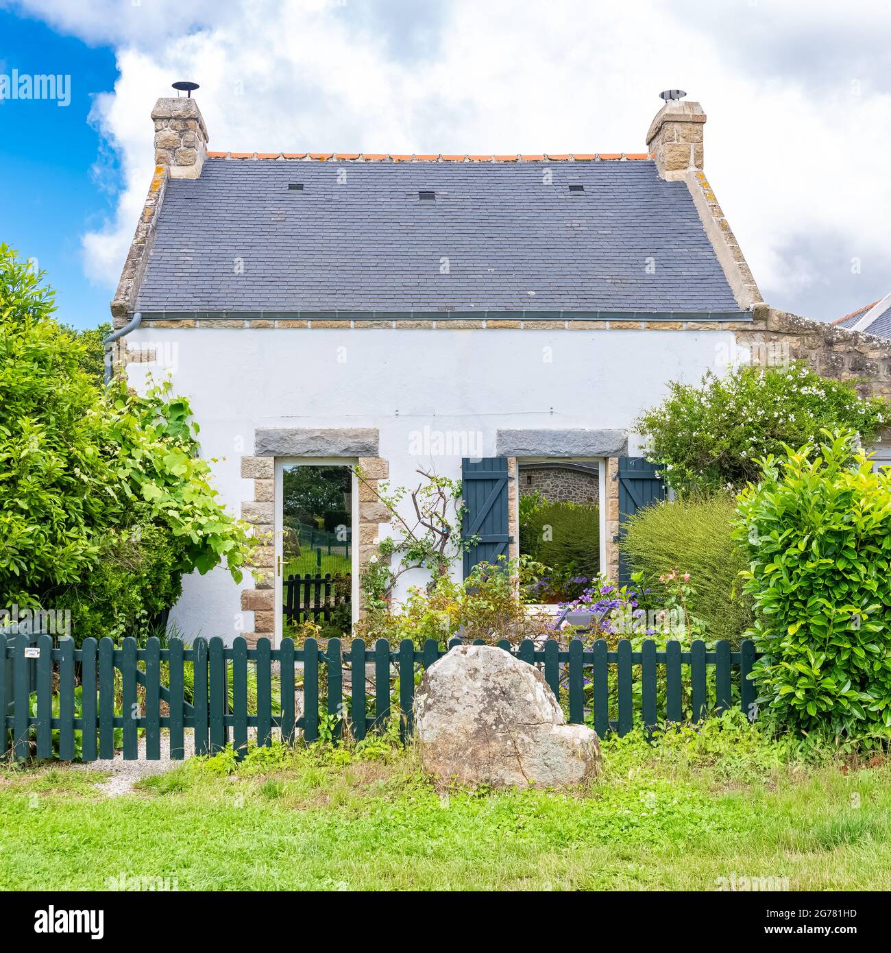 Carnac in Brittany, typical house in a stones field Stock Photo Alamy