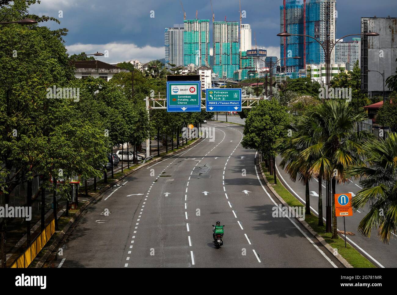 Kuala Lumpur Malaysia 11th July 2021 A Food Delivery Rider Seen Riding Along An Empty Street In Downtown Kuala Lumpur Credit Sopa Images Limited Alamy Live News Stock Photo Alamy