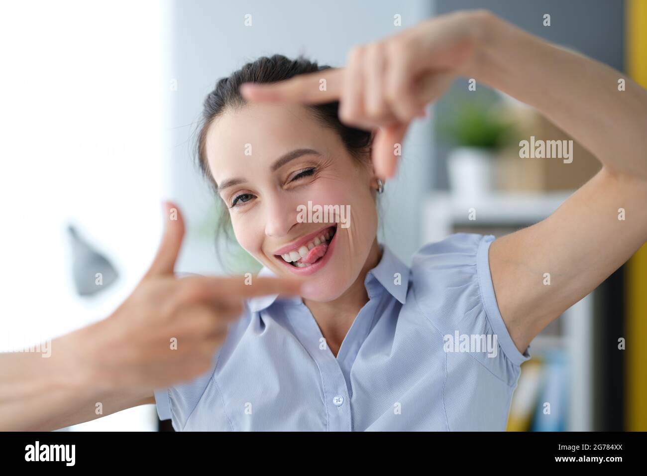 Portrait of young beautiful woman making frame with own hands Stock ...