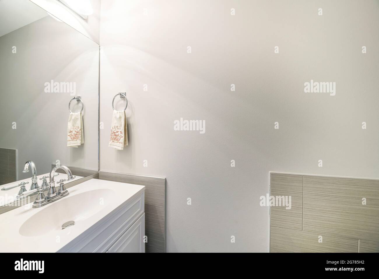 Modern bathroom vanity sink with stainless fixtures Stock Photo - Alamy