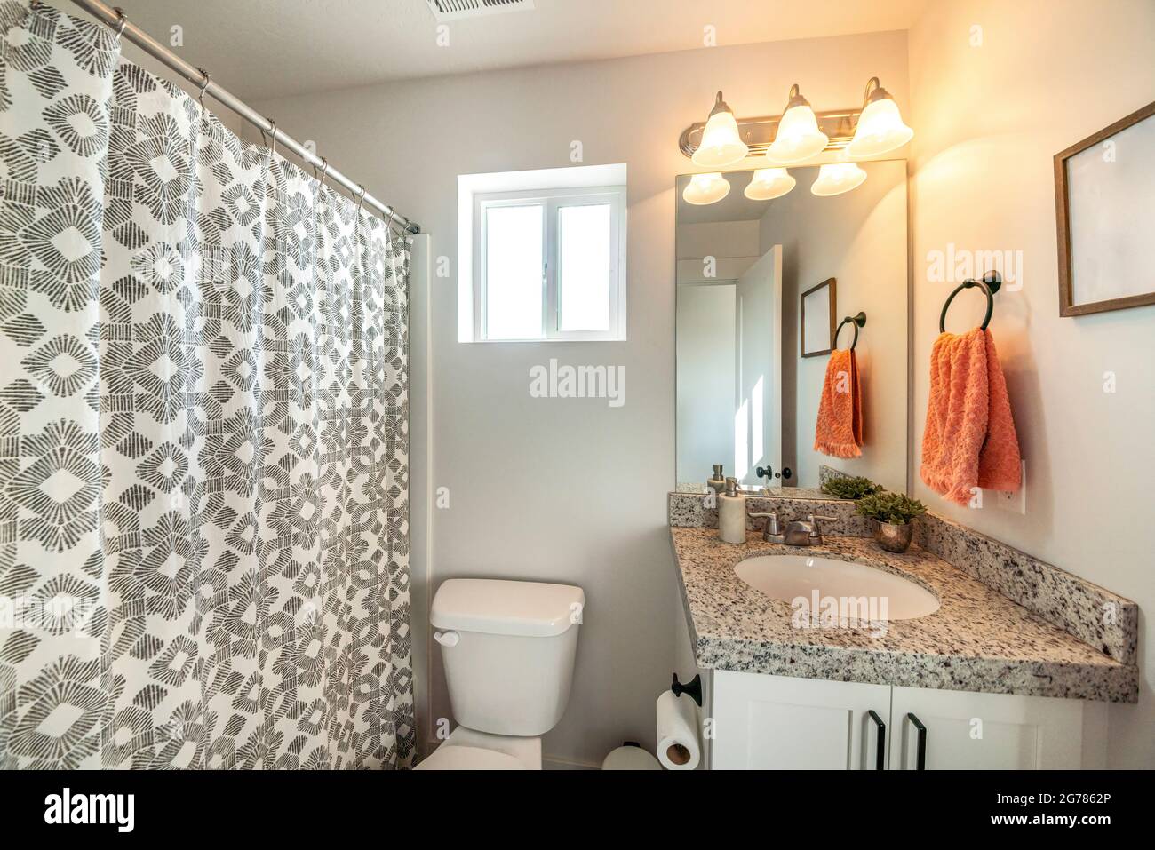 Bathroom interior with ambient lighting and window Stock Photo - Alamy