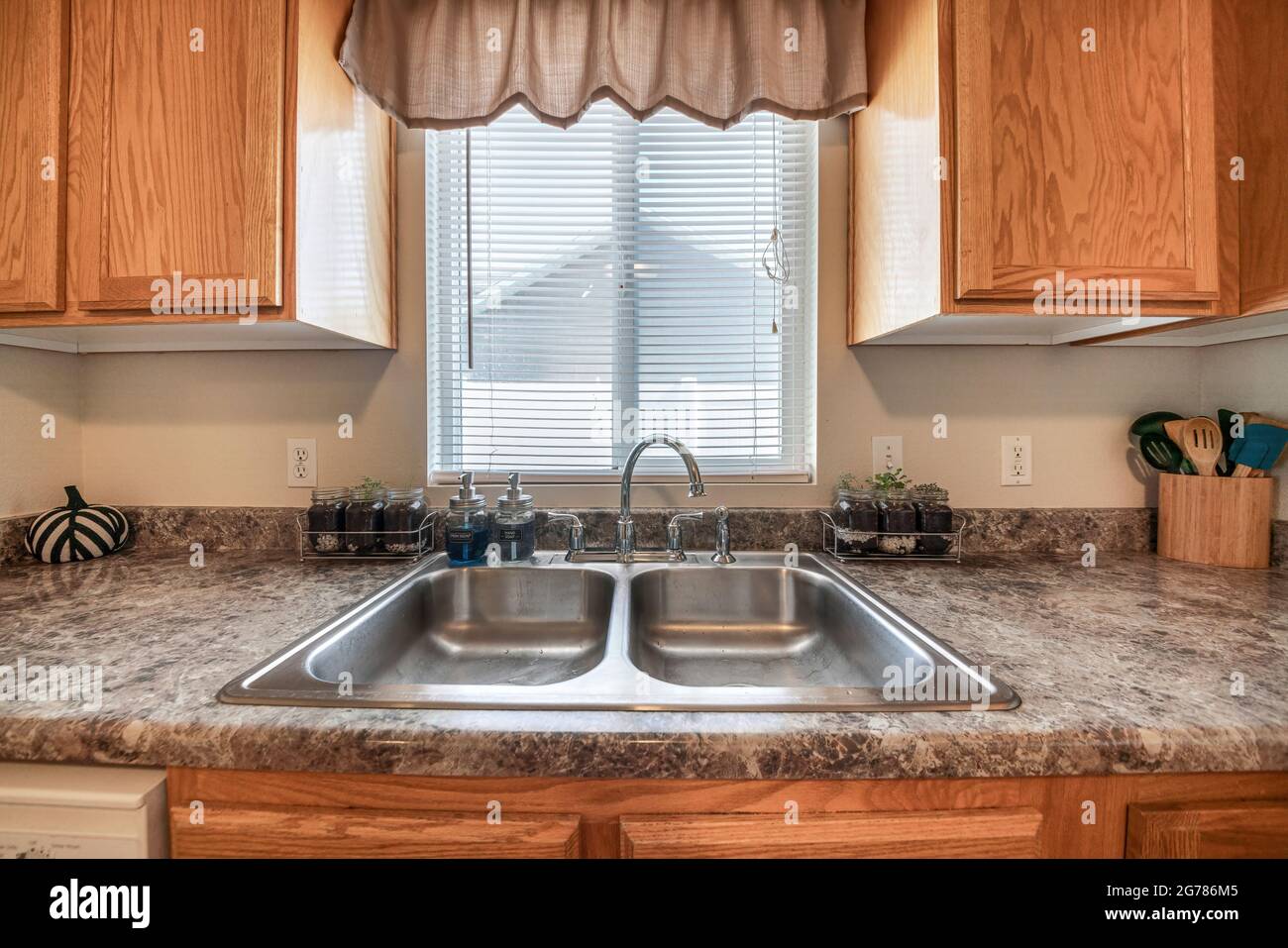 Craftsman style kitchen vanity sink with wood Stock Photo Alamy