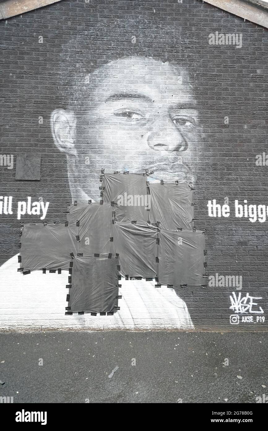 Wording on the vandalised mural of Manchester United striker and