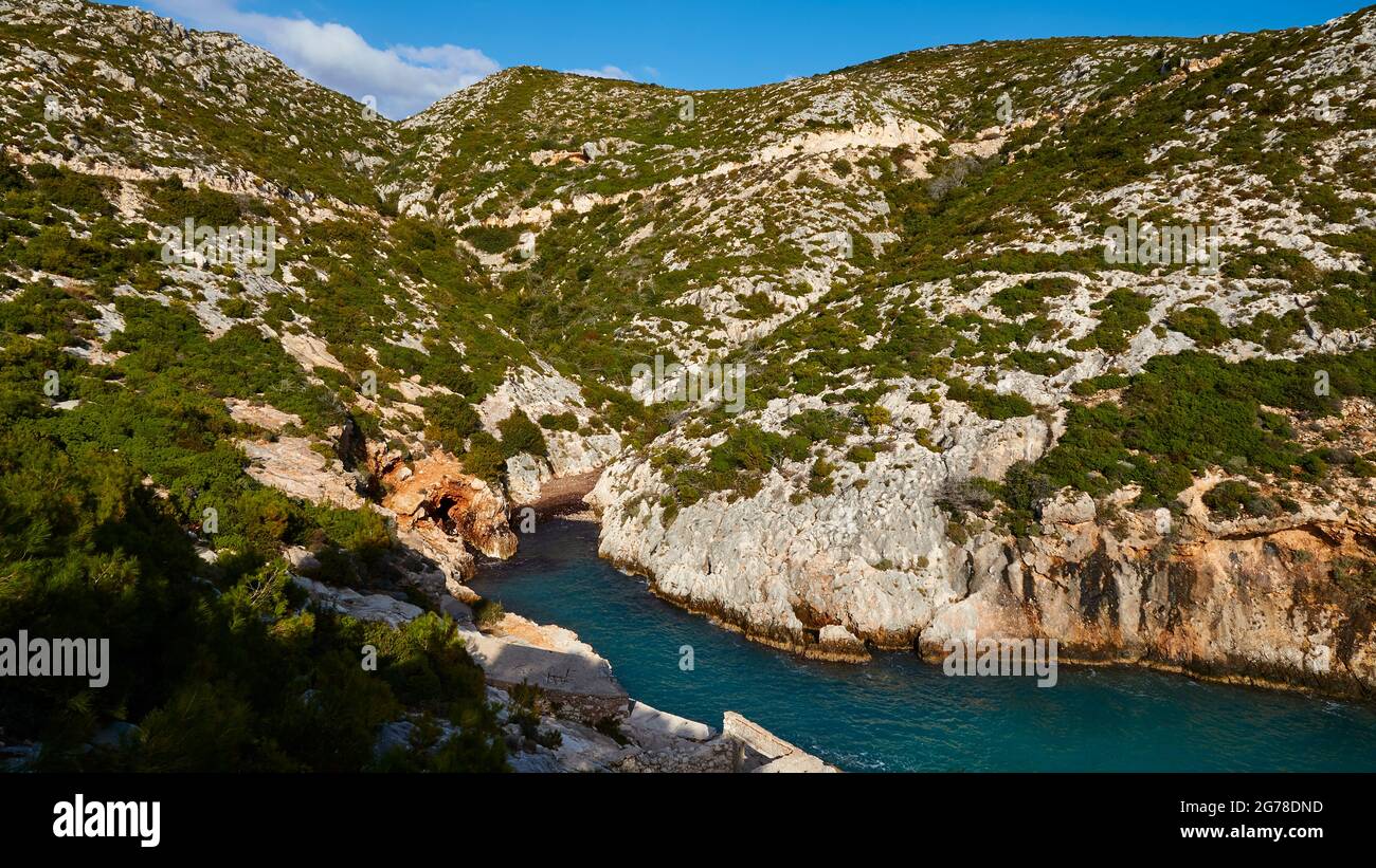 Ionian Islands, Zakynthos, west coast, Adriatic Sea, view of the deeply indented bay towards the hill in the east, blue water, overgrown hill rises at the end of the bay, blue sky with a single white cloud Stock Photo