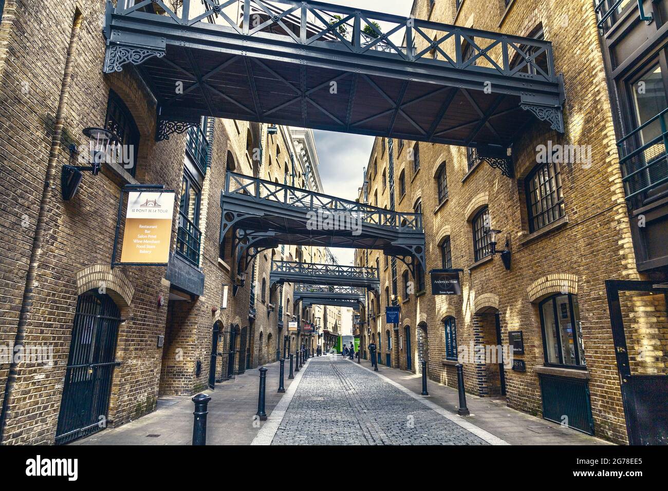 Walkways between warehouses at Shad Thames, London, UK Stock Photo